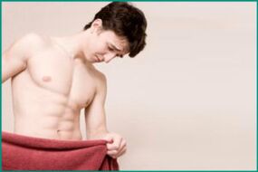 Dor no períneo de um homem com prostatite